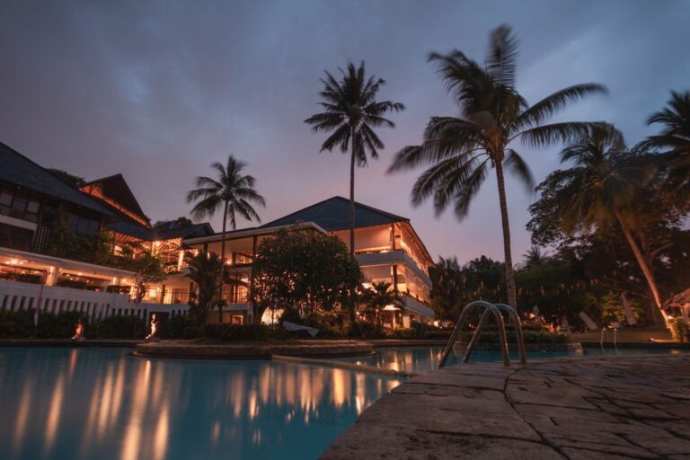 Hotel resort pool glowing at dusk