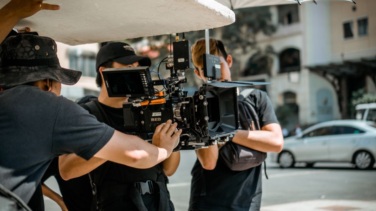 Professional cinema camera crew on location